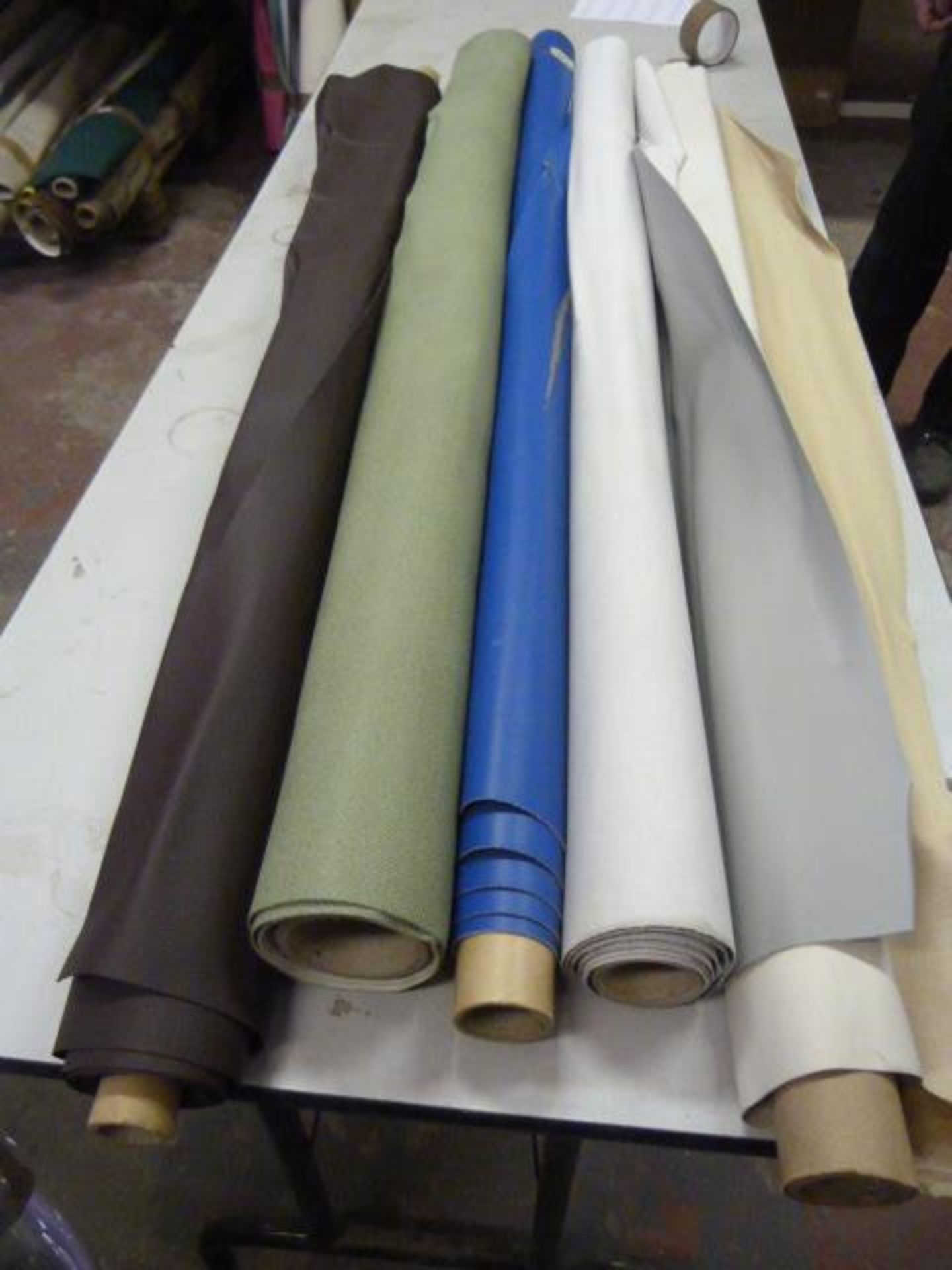 *Five Small Rolls of Leatherette & Various Upholstery Cloth