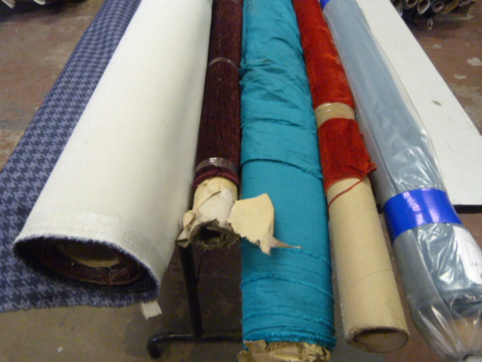 *Five Small Rolls of Assorted Fabrics, Cloth and Material