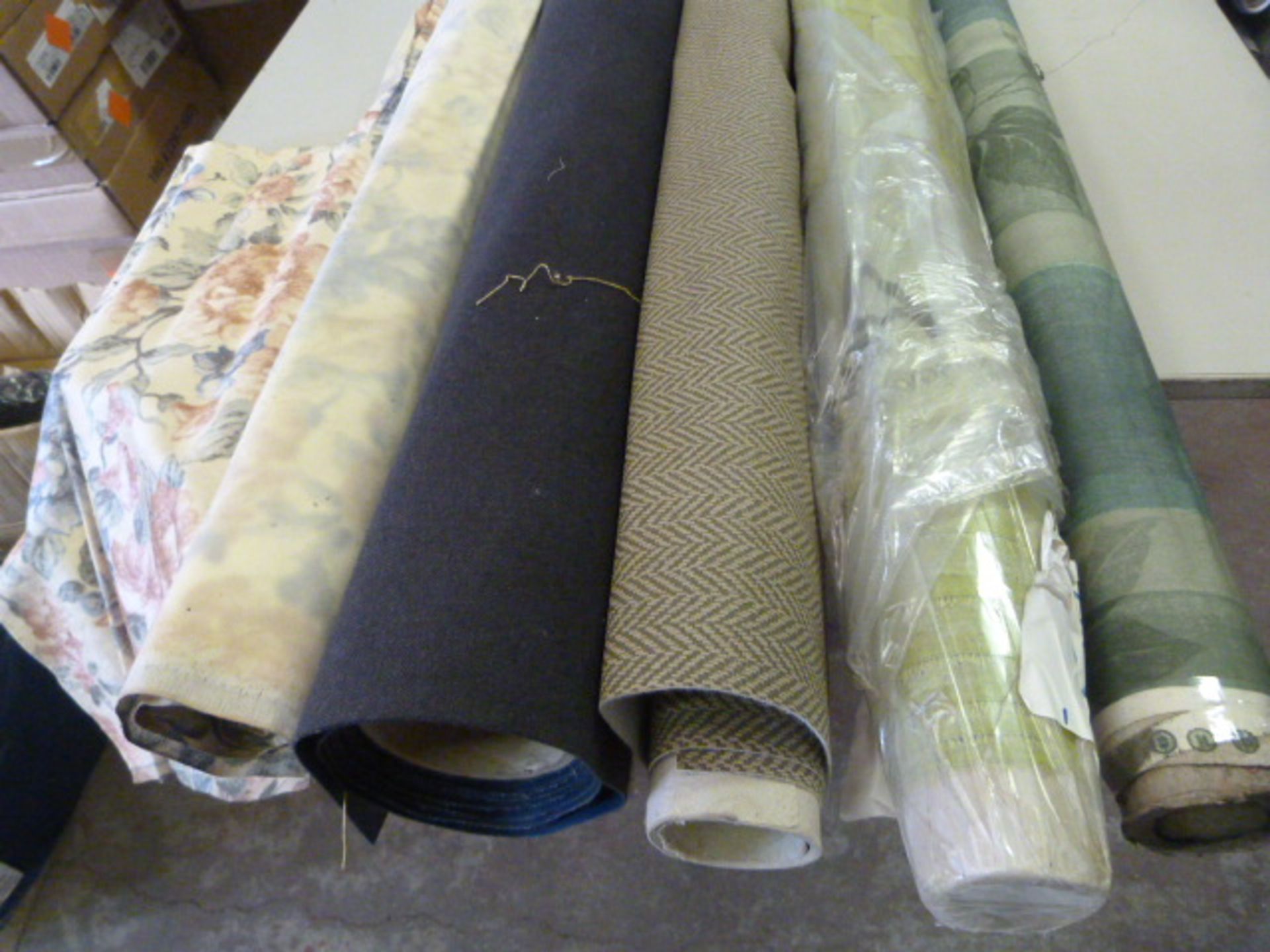 *Five Small Rolls of Assorted Fabrics, Cloth and Material