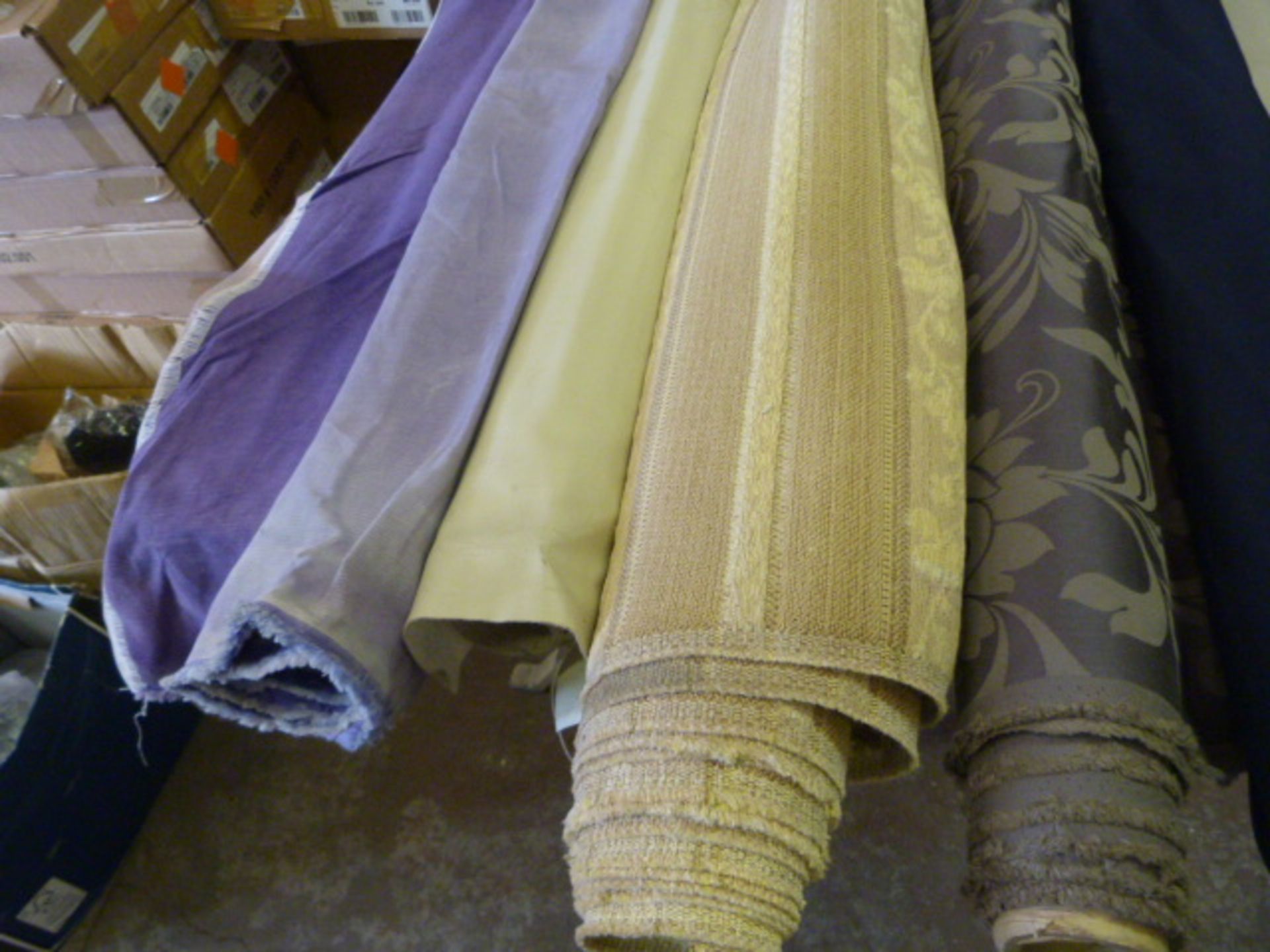 *Five Small Rolls of Assorted Fabrics, Cloth and Material