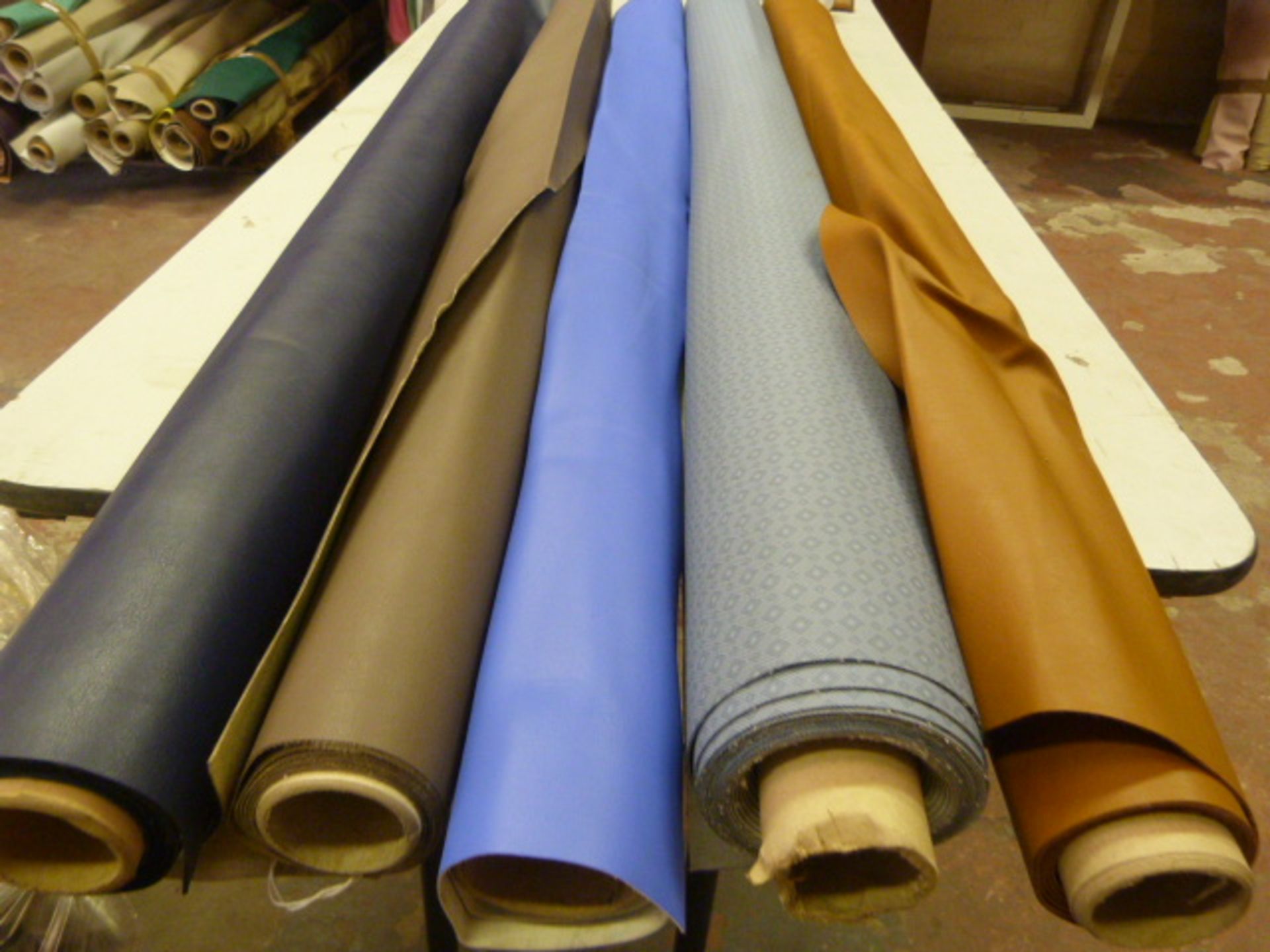 *Five Small Rolls of Leatherette & Various Upholstery Cloth