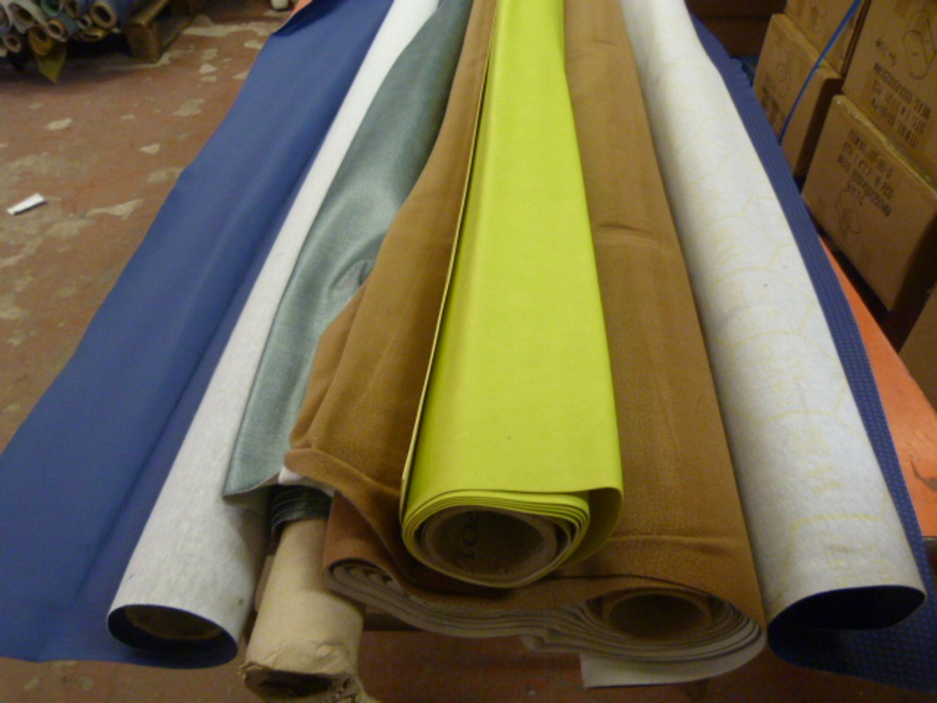 *Five Small Rolls of Leatherette & Various Upholstery Cloth