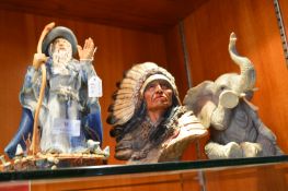 Figurine of Merlin, Elephant and a First Nation In