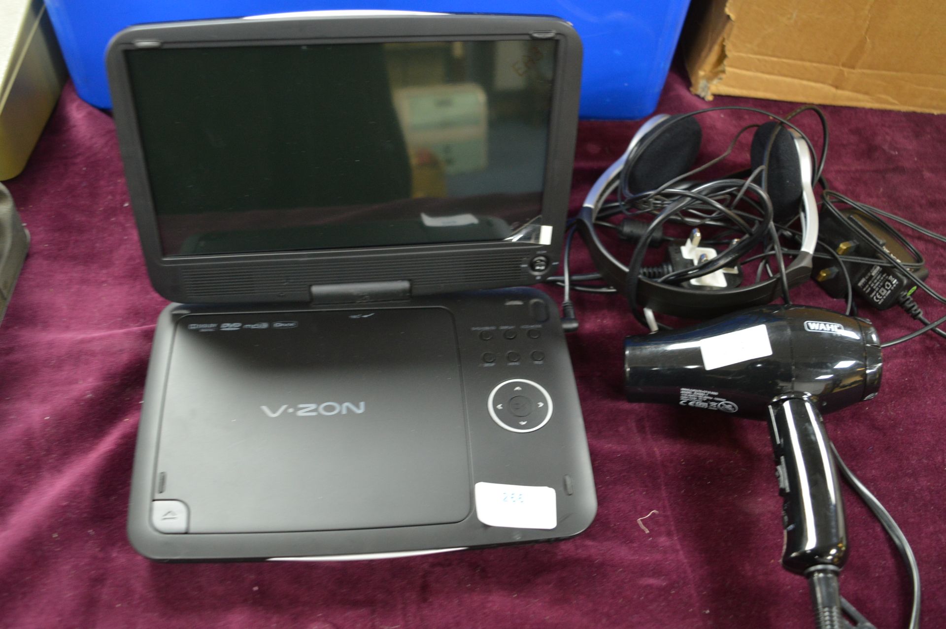 V.Zone Portable DVD Player and a Wahl Mini Hair Dr