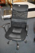 Black Fabric Backed Chrome Office Swivel Chair