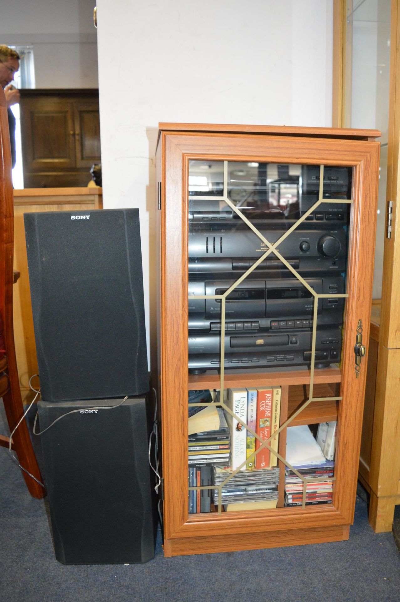 Cabinet with Sony Sound System, CDs, etc.