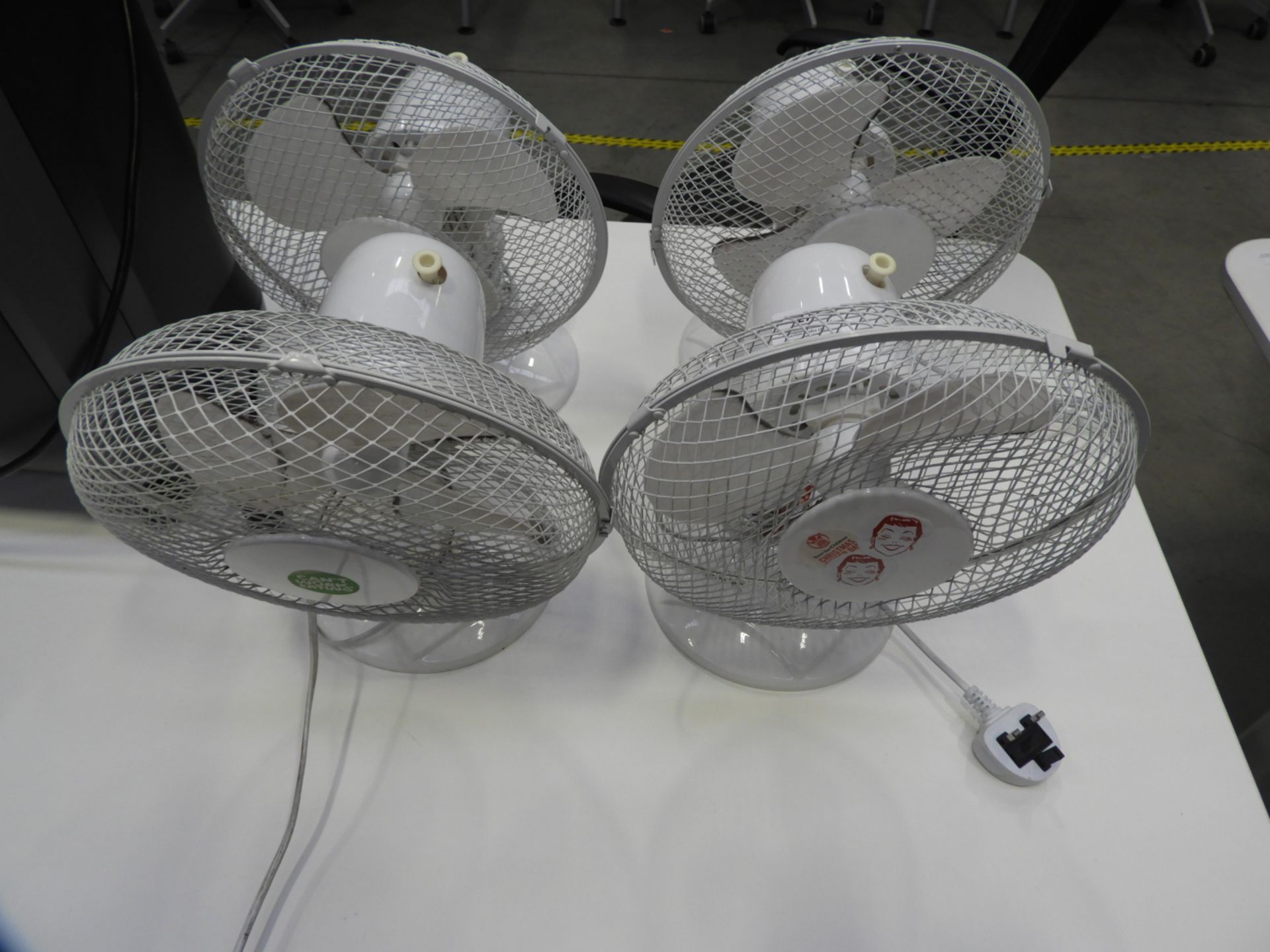 *Four Desktop Oscillating Fans