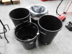 *Four Black Waste Bins