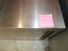 * St Steel wall cabinet, shelving good condition. (600H x 1500W x 400D)