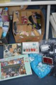 Box of New Items Including Jigsaws, Clothing, etc.