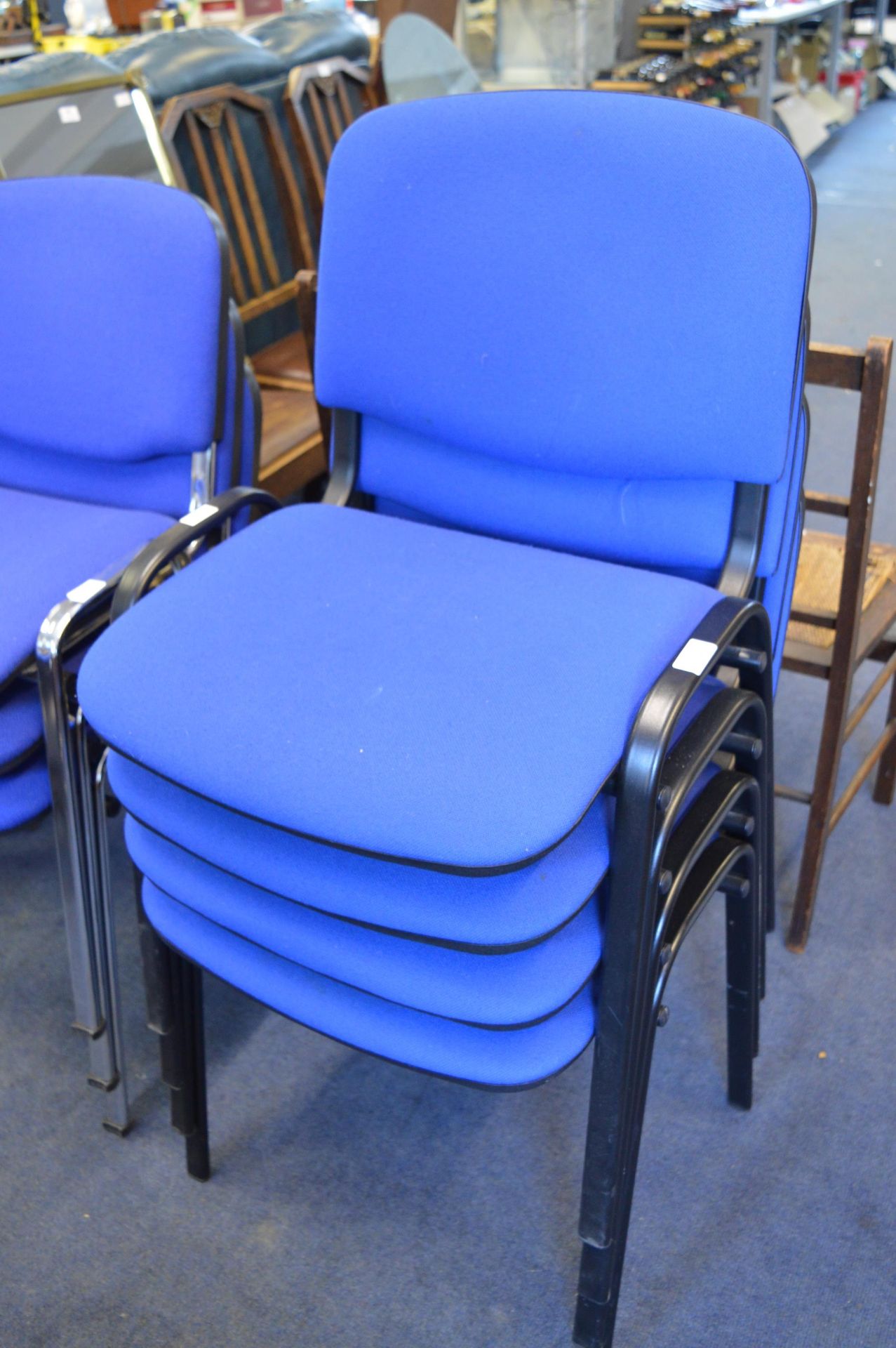 Four Metal Framed Blue Upholstered Office Chairs