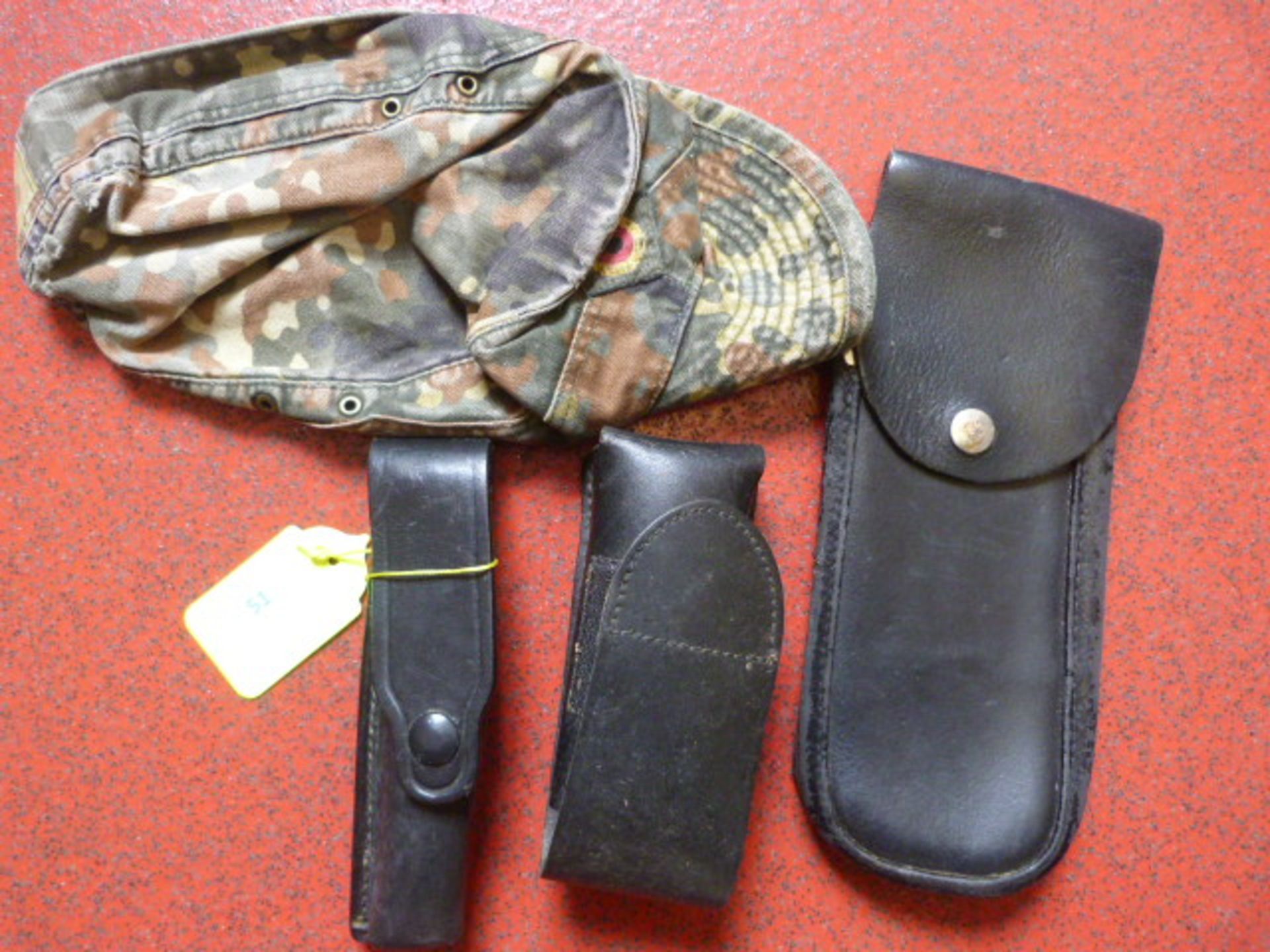 Three Leather Pouches and a German Cap