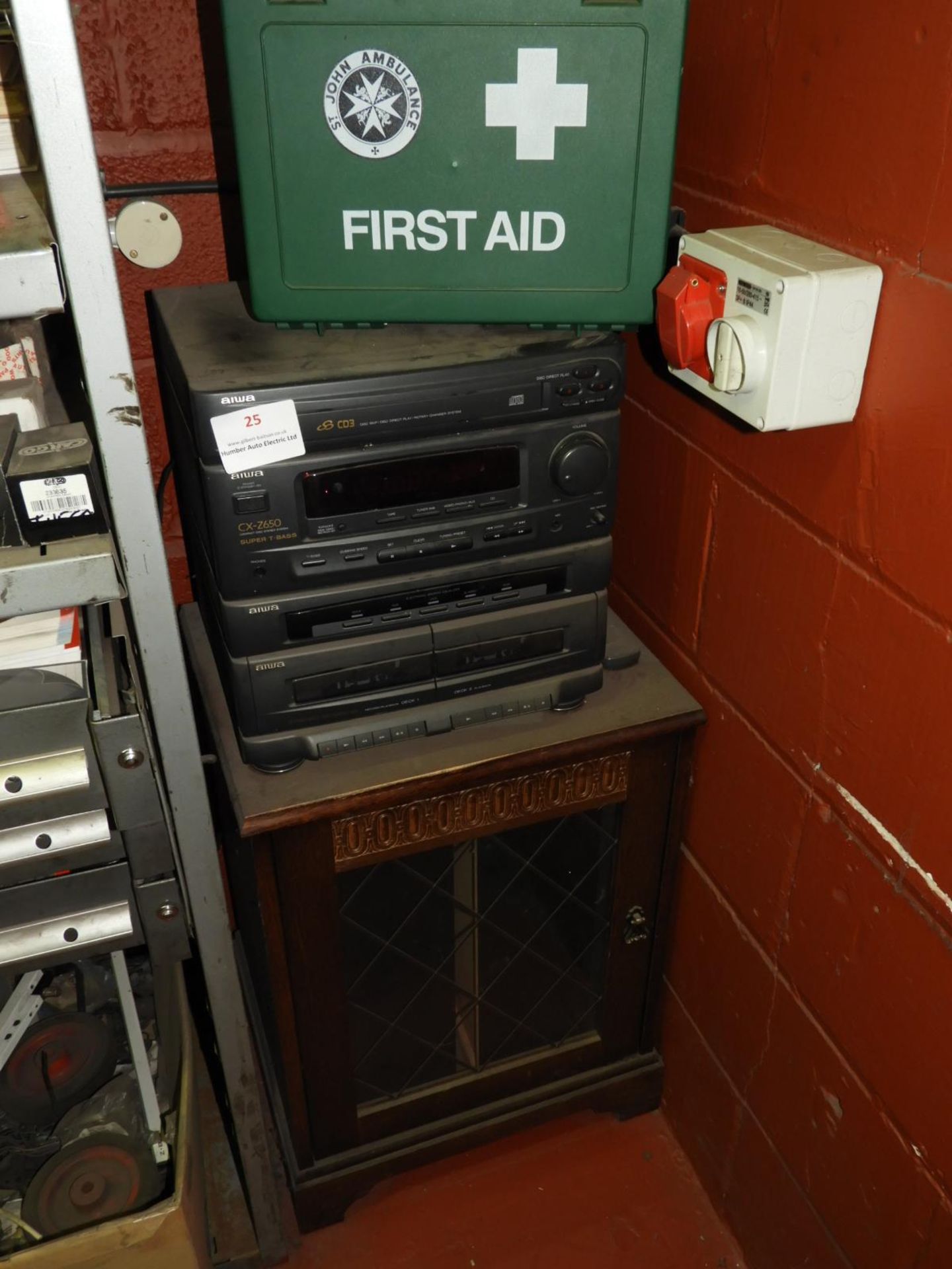 *Aiwa Music System, Dart Board and a First Aid Kit