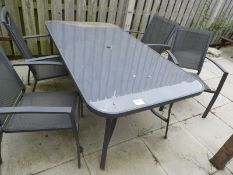 *Outdoor Table with Four Chairs