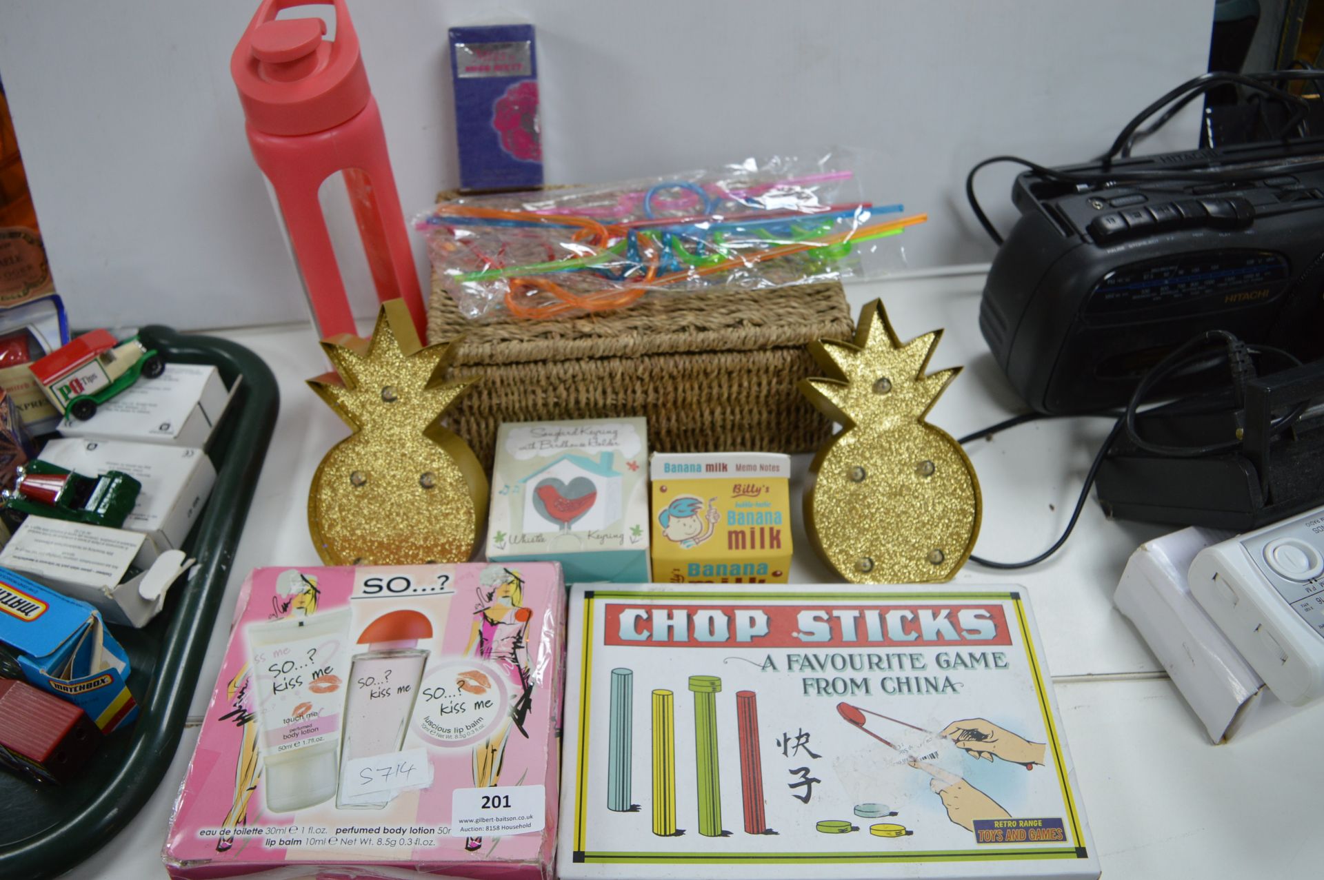 Assorted Items Including Perfumes, Drinks Bottles,