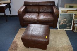 Two Seat Brown Leather Sofa with Matching Pouffe