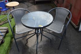 Glass Topped Garden Table and a Pair of Matching C