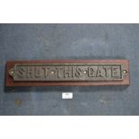Cast Iron "Shut This Gate" Sign Mounted on Wooden Plaque