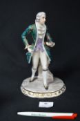 Unsigned Continental Figurine of a Young Gentleman