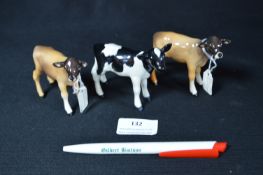 Three Beswick Calves