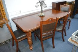 Wind Out Mahogany Dining Table with Four Matching Brown Leather Upholstered Chairs