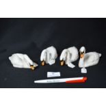 Four Beswick Swans