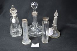 Five Cut Glass Crystal Items; Decanter, Scent Bottles, etc. with Silver Lids and Collars