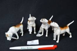 Four Beswick Fox Hounds