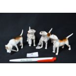 Four Beswick Fox Hounds