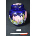 William Moorcroft Magnolia Pattern Covered Jar on Blue Ground