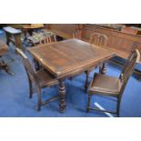 1930's Oak Extending Dining Table with Four Matching Leatherette Upholstered Chairs