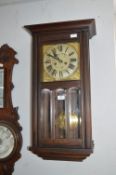 Mahogany Cased Pendulum Wall Clock with Brass & Enamel Face