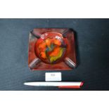 Moorcroft Hibiscus Pattern Ashtray on Dark Red Ground