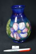 Moorcroft Clematis Pattern Squat Vase on Blue Ground