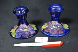 Pair of Moorcroft Clematis Pattern Candlesticks on Blue Ground