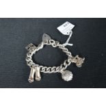 Sterling Silver Charm Bracelet with Assorted Charms