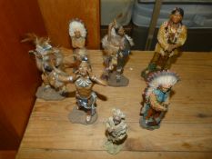 Seven Small Native American Figures