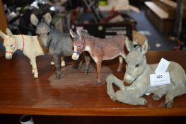 Four Donkey Figures