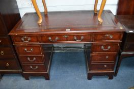 Desk with Nine Drawers and Red Tooled Leather Inlay