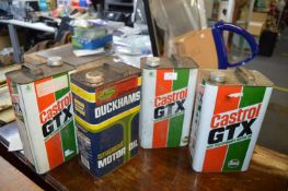 Four Castrol and Duckhams Vintage Oil Cans