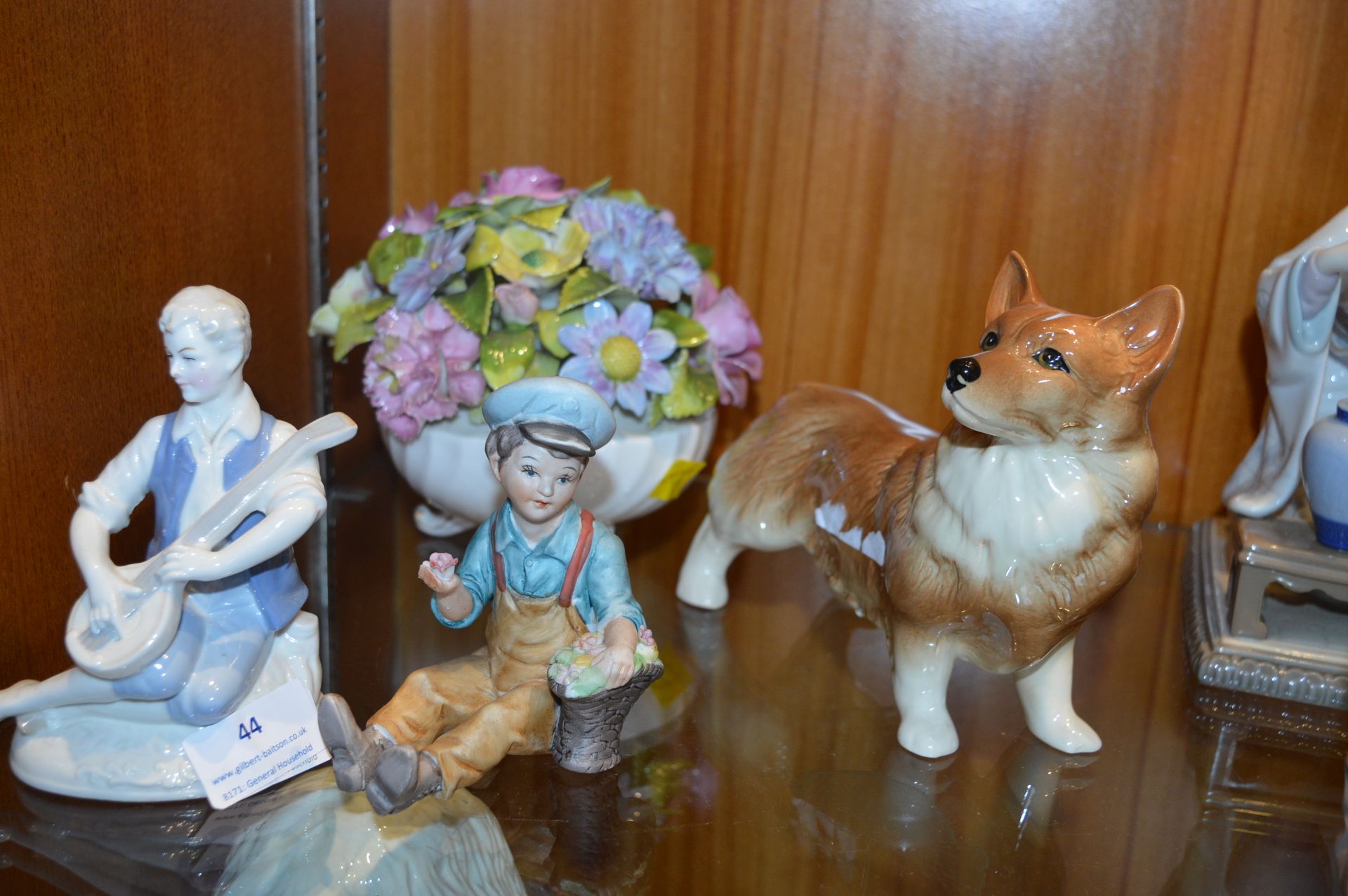 Four Pottery Items; Corgi, Two Boy Figures and a B