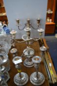 Three Silver Plate Candelabras and a Pair of Candl