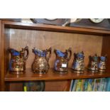 Six Victorian Copper Luster Jugs