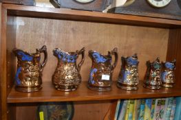 Six Victorian Copper Luster Jugs