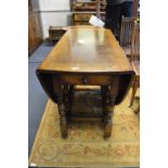 Oak Drop Leaf Oval Dining Table by Titchmarsh & Goodwin