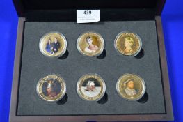 Six Cased Commemorative Coins; Moon Landing, Henry VIII, etc.