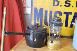 Large Vintage Black Enameled Lidded Pans, and a Tilley Lamp