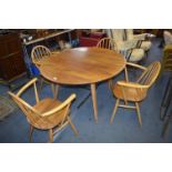 Ercol Oval Drop Leaf Dining Table and Four Matching Chairs