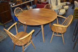 Ercol Oval Drop Leaf Dining Table and Four Matching Chairs