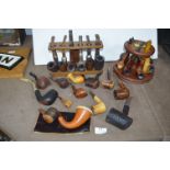 Two Pipe Racks and a Collection of Pipes